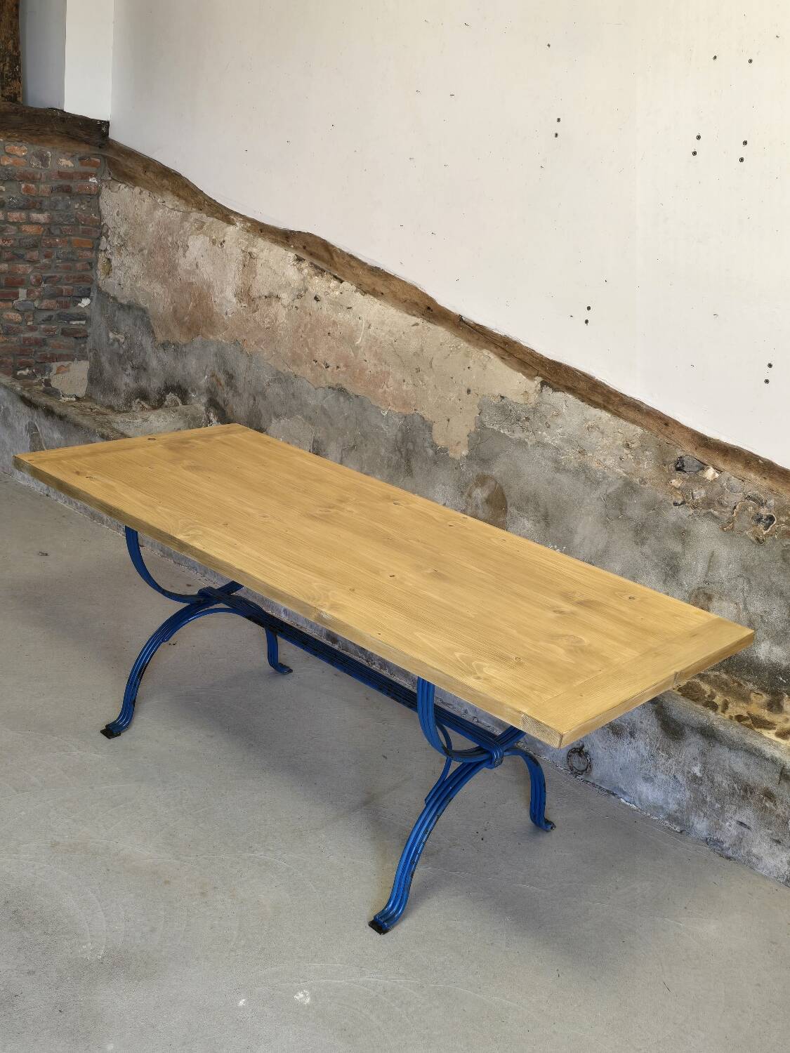 Wrought iron and solid wood table