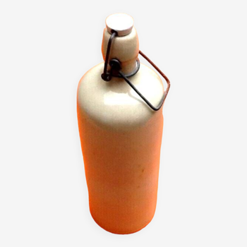 Bottle / old hot water bottle enameled stoneware