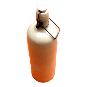 Bottle / old hot water bottle enameled stoneware