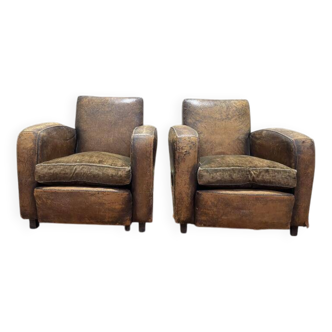 Paire de fauteuils Club en cuir utilisés
