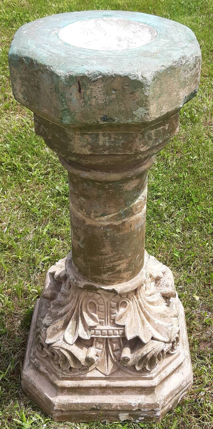 Holy water font on stone column (17th century)