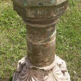 Holy water font on stone column (17th century)