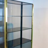 Armoire en verre fumé et laiton