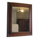 Large mirror in natural stained wood