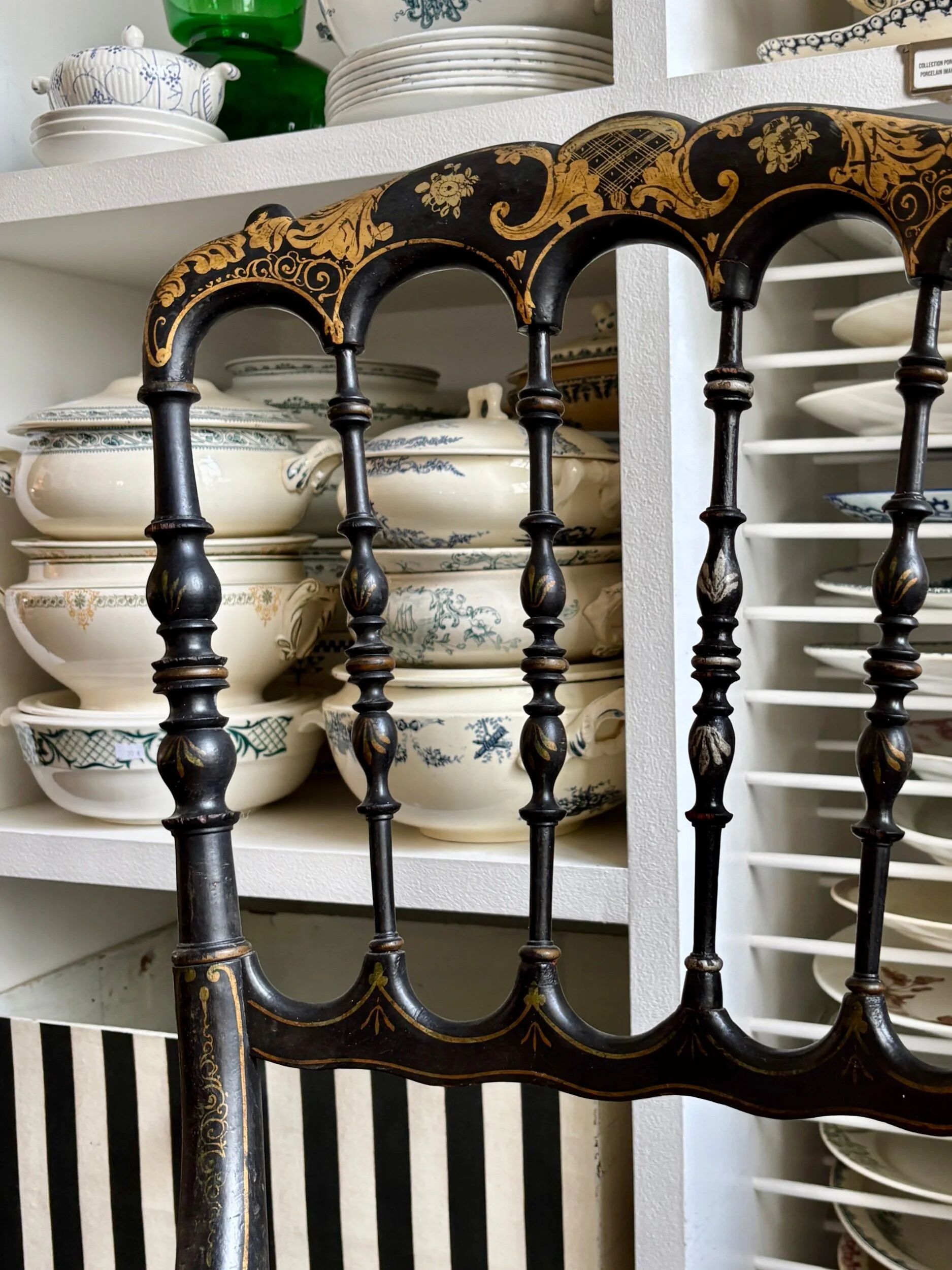 Napoleon III chair in black and gold wood with caning.