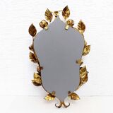 Old candlestick mirror gilded with leaf