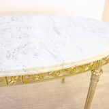 Oval coffee table in marble and brass