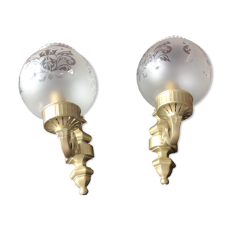Pair of wall lamps in gilded metal and frosted glass art deco style