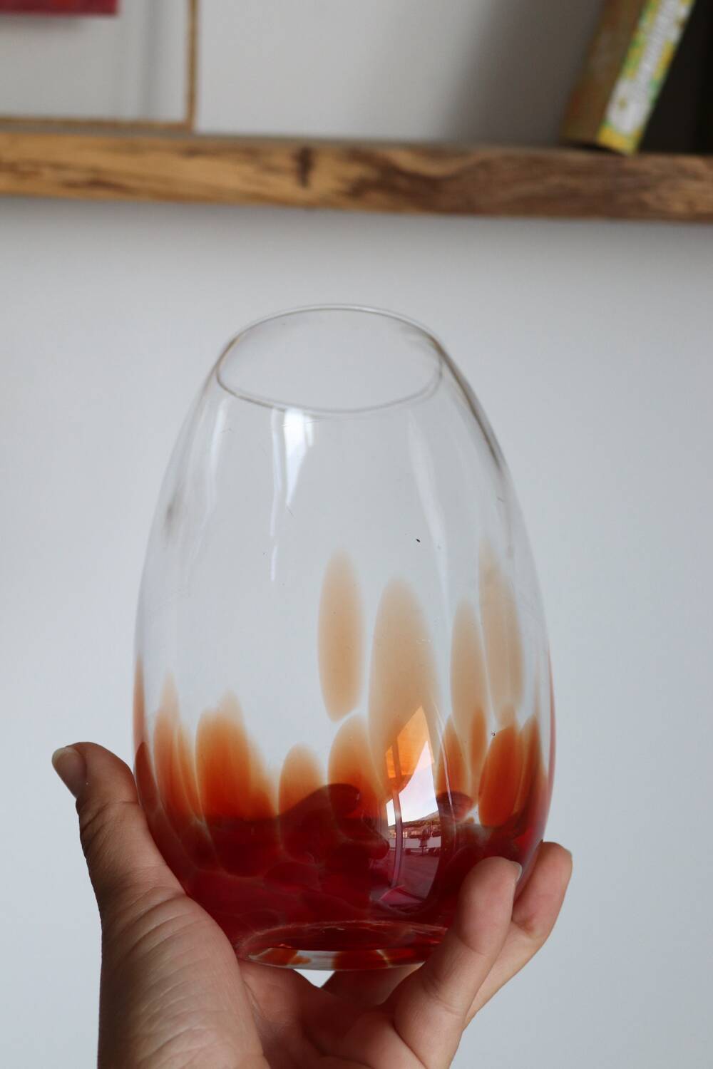 Vintage blown glass vase with a speckled red design