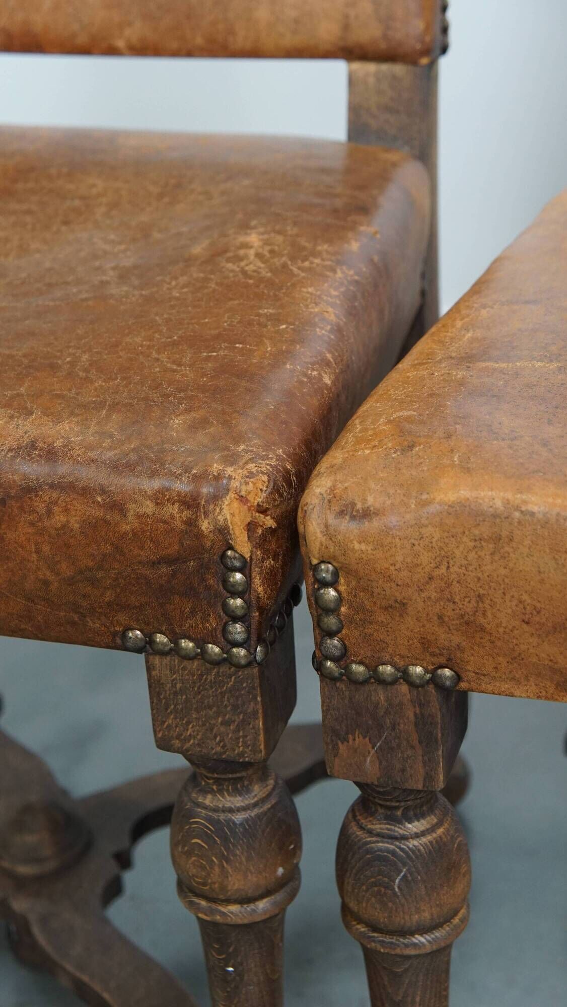 Set of 4 antique wooden and sheepskin leather dining chairs