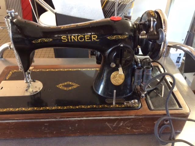 Machine à coudre singer portable