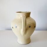 Vintage butter yellow ceramic pitcher in rustic style