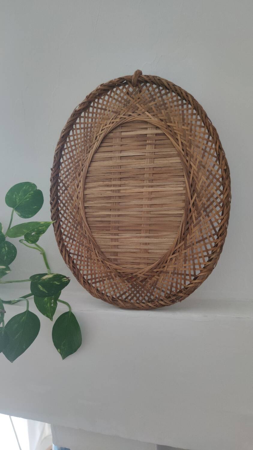 Oval mirror in woven wicker