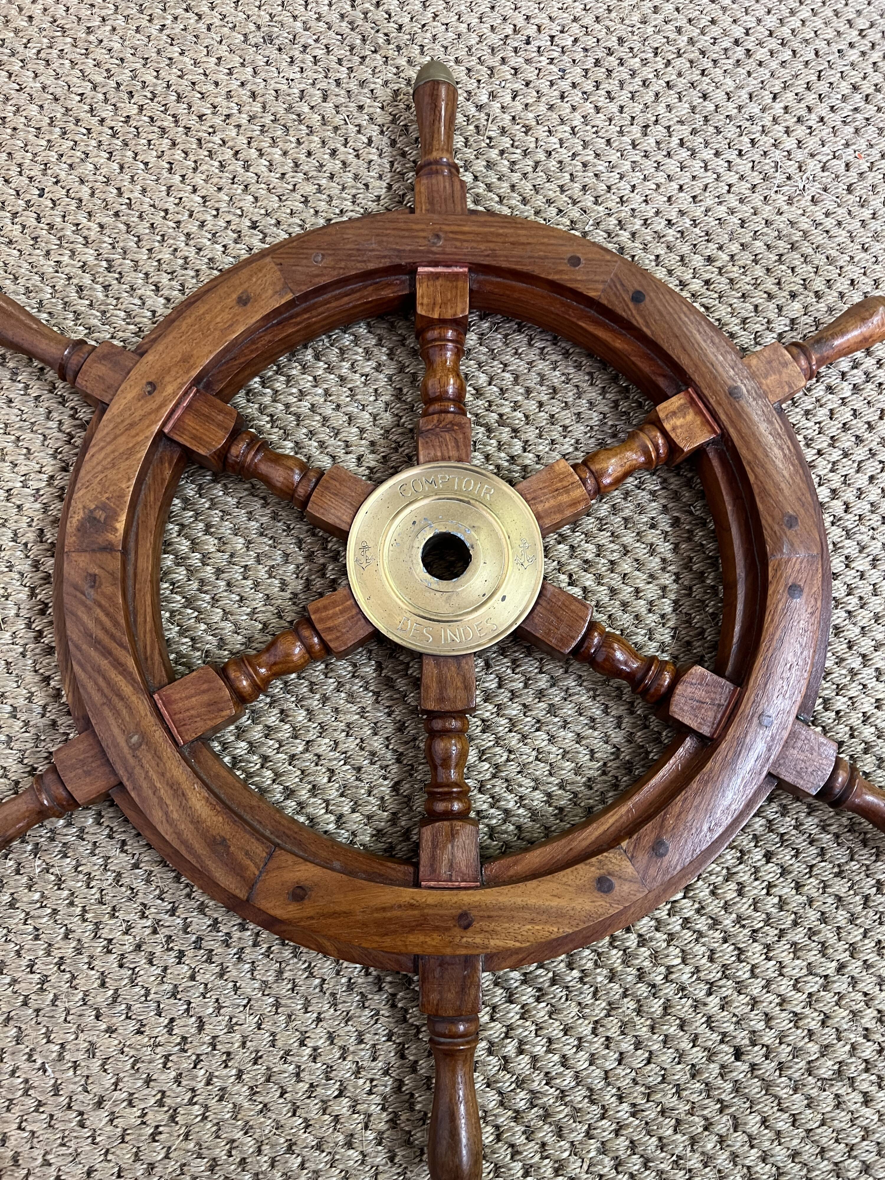 Rudder bar wheel boat in wood and brass "Comptoir des Indes" shelf