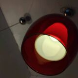 Pair of conical pendant lights in red tinted glass