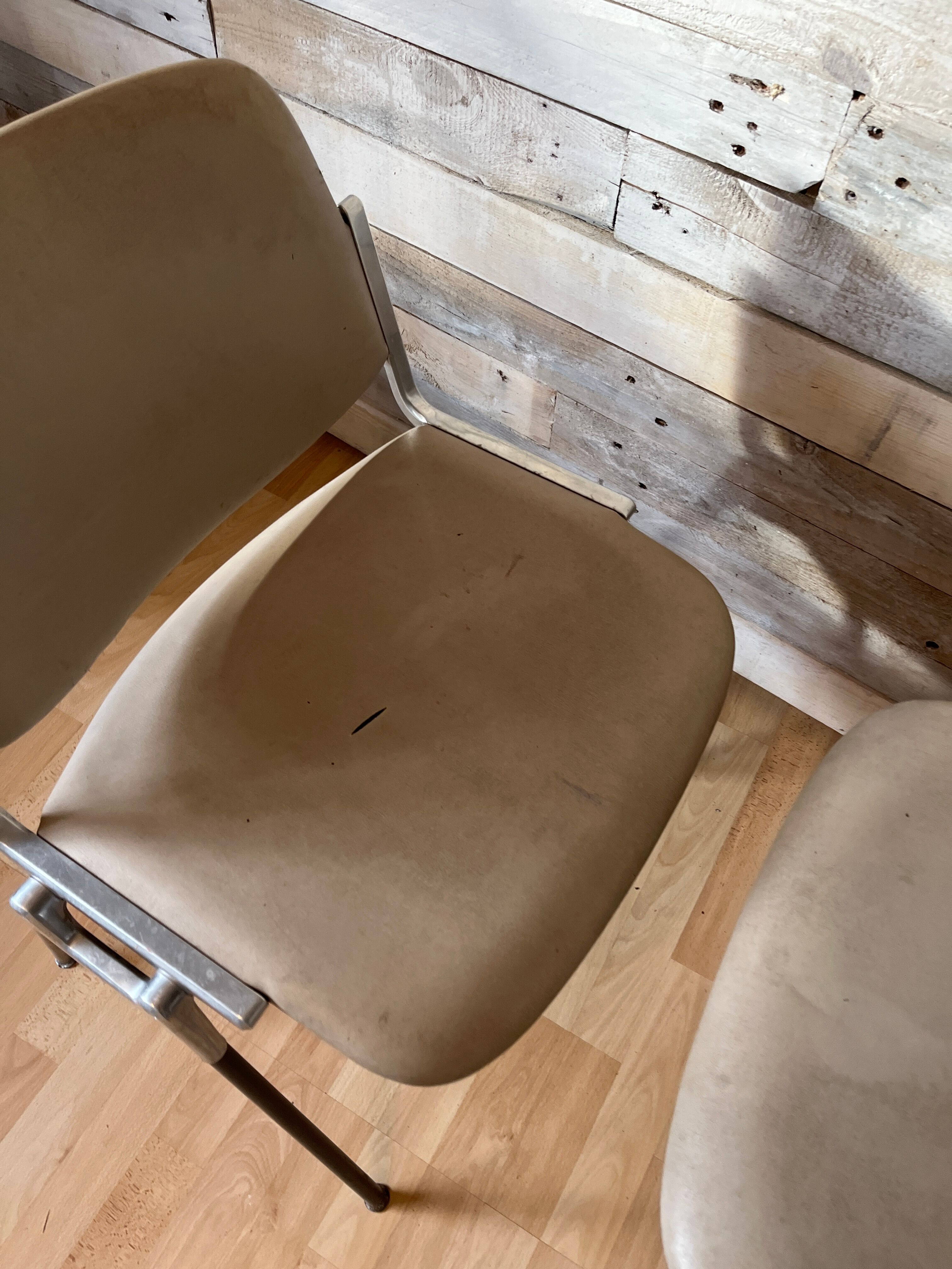 Pair of stackable chairs by Giancarlo Piretti for Castelli