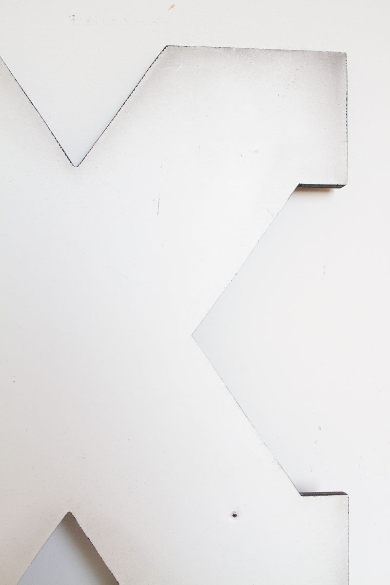 Enamelled letter X