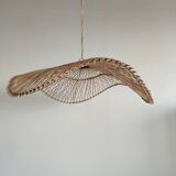 Rattan suspension or lighting fixture in the shape of an undulating circular tray with lattices