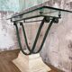 Glass and metal console with antique patina