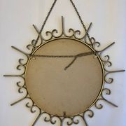 Miroir soleil en métal doré