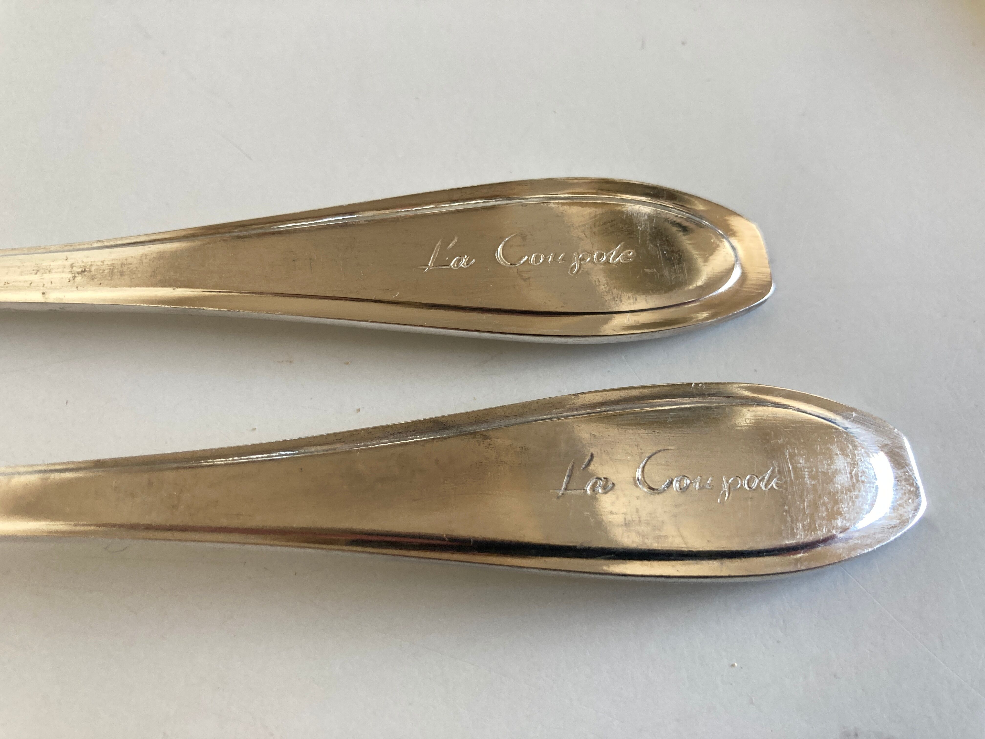Set of 12 knives and 12 forks of brasserie La Coupole 1970