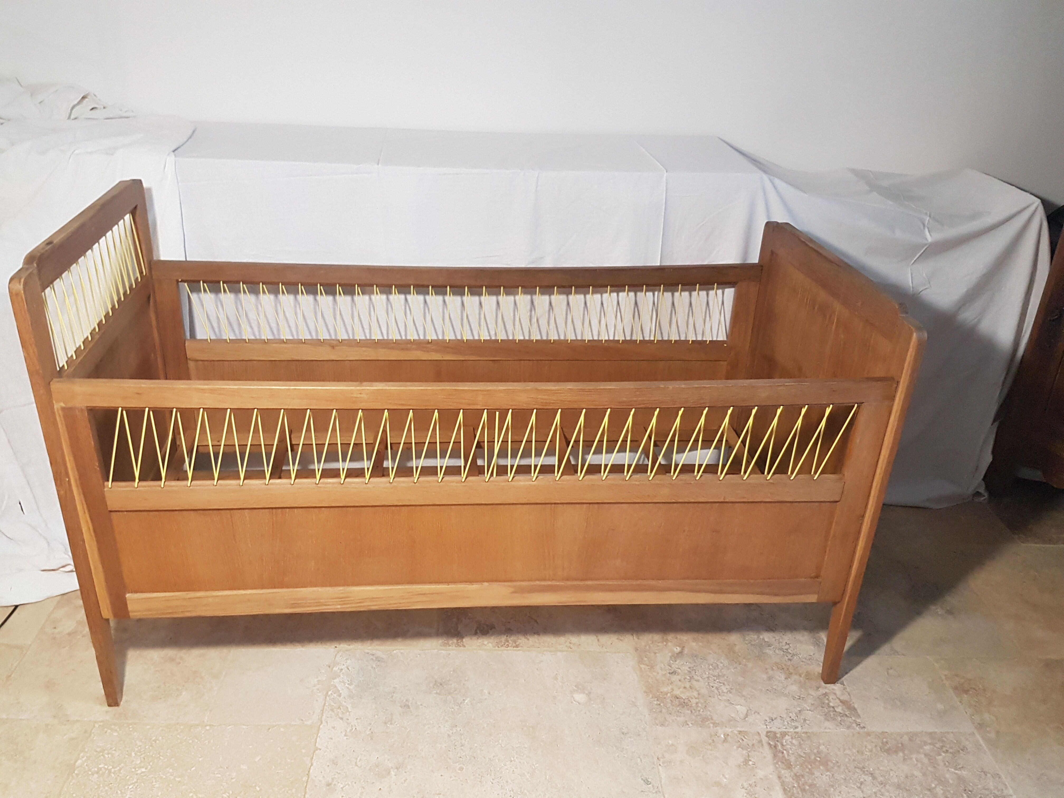 Children's bed made of wood and yellow scoubidou, 1950s.