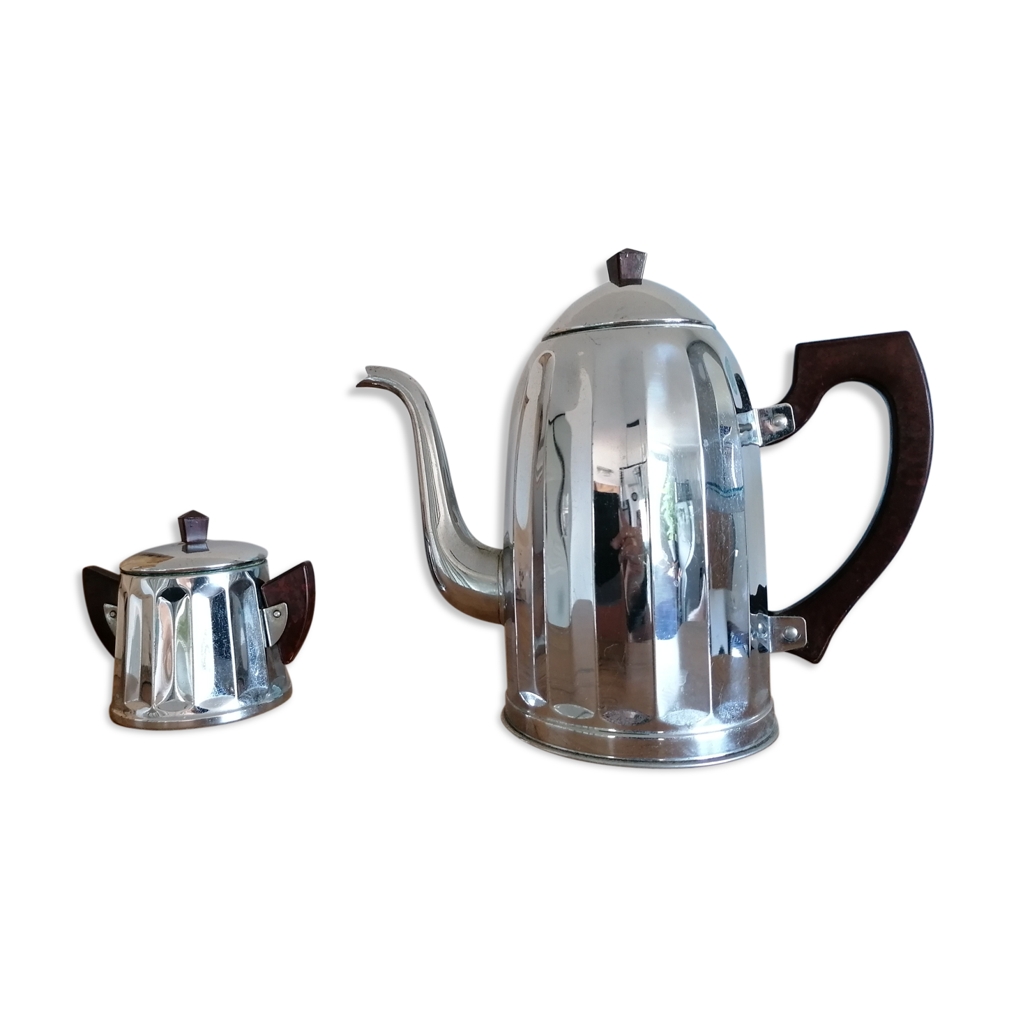 old coffee maker and its stainless steel sugar bowl