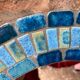 Round ceramic mirror with blue mosaic decor circa 1960