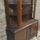Vintage two-body display cabinet in oak from the 1950s.