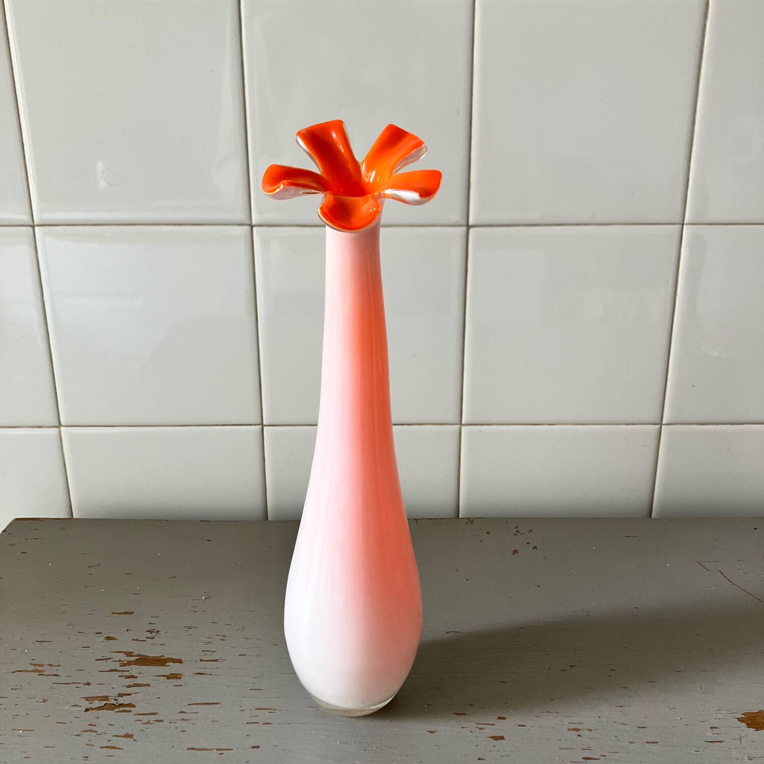 Long pink vase with petal collar
