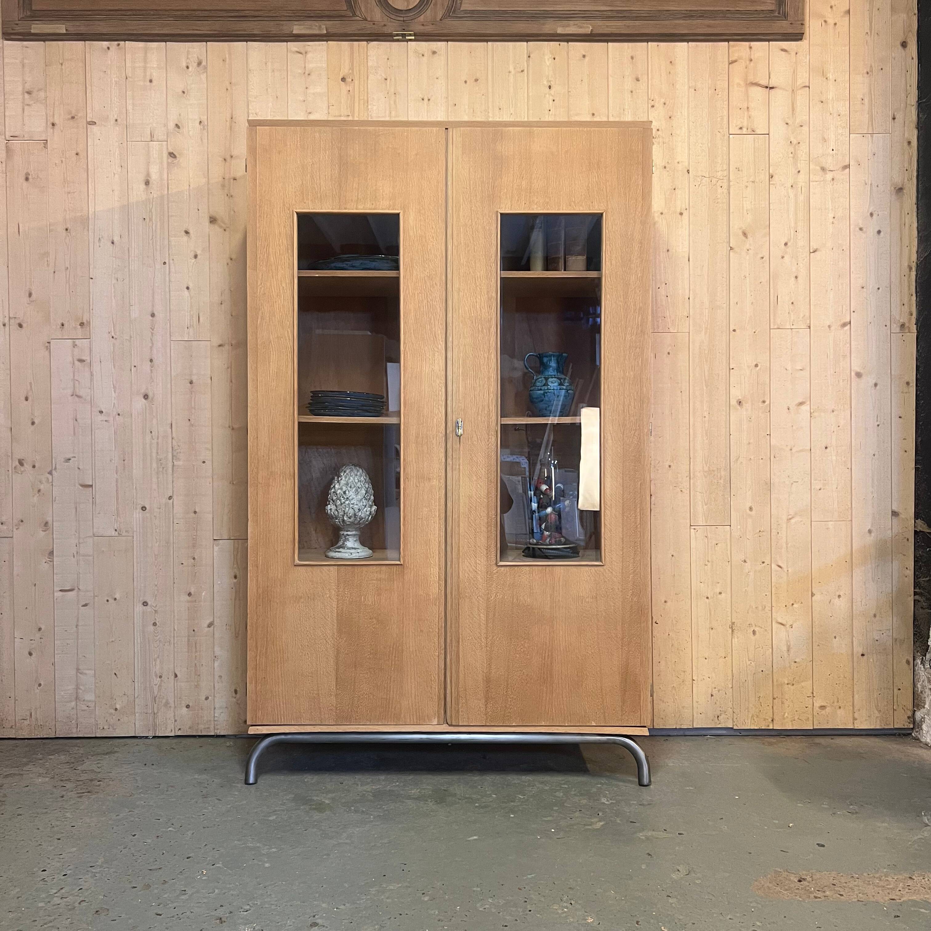 Glass-fronted school cabinet in raw oak
