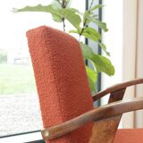 Vintage orange curly papaya armchair 1970