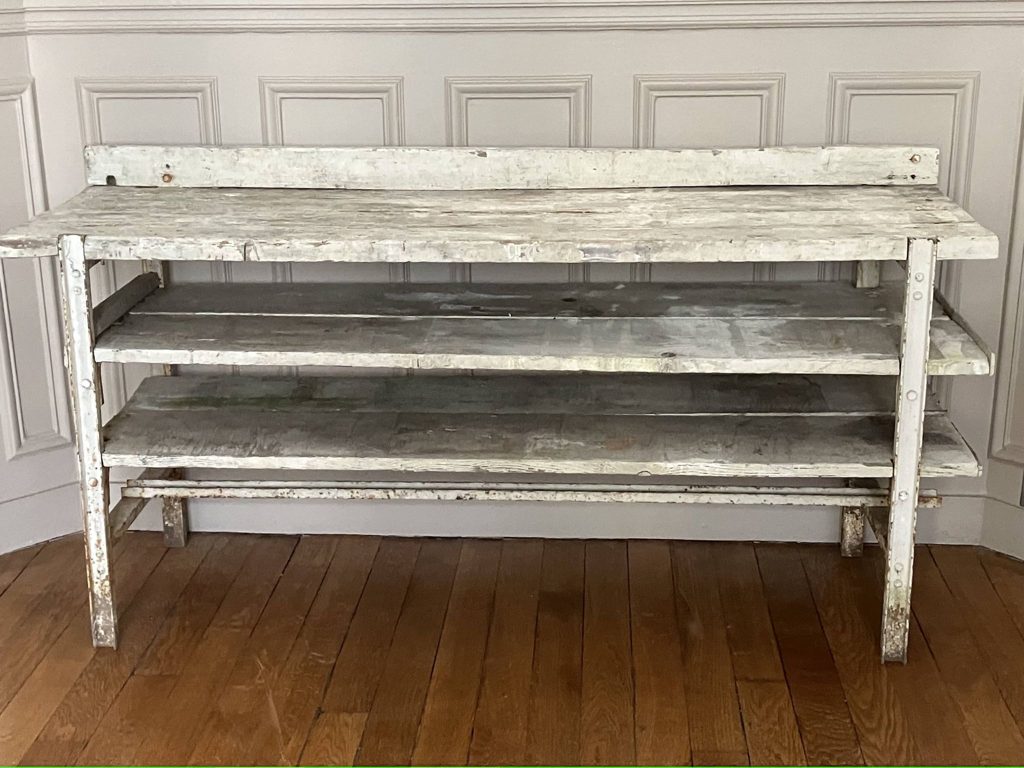 Old workbench, a piece of wooden and metal furniture.