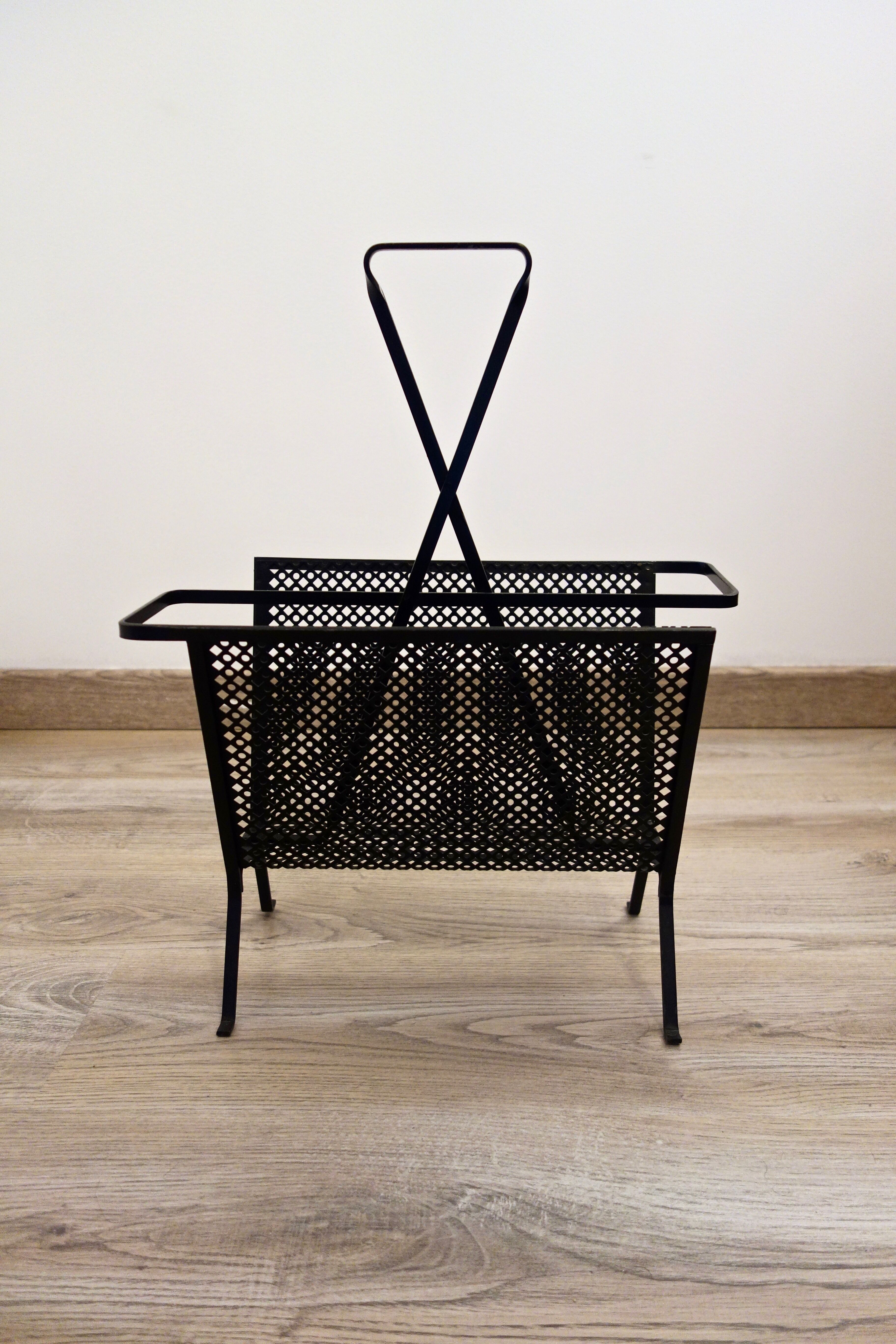 Mathieu Matégot's magazines rack from the 1950s