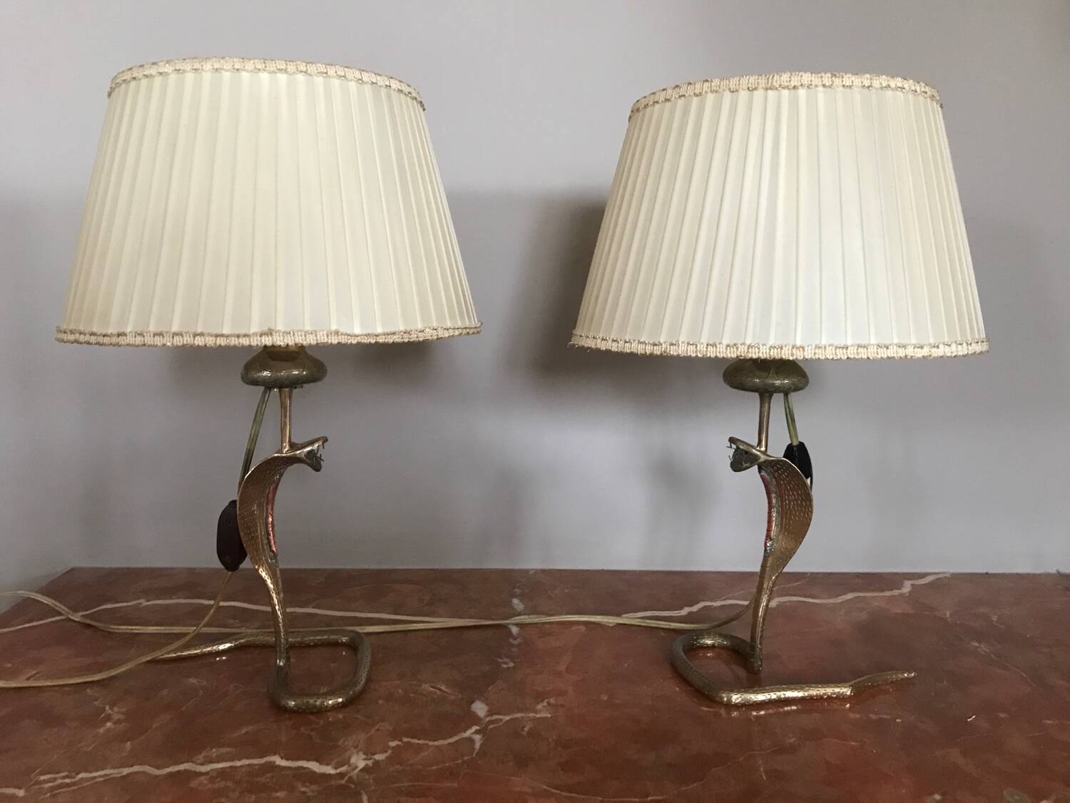 Magnificent pair of cobra bedside lamps