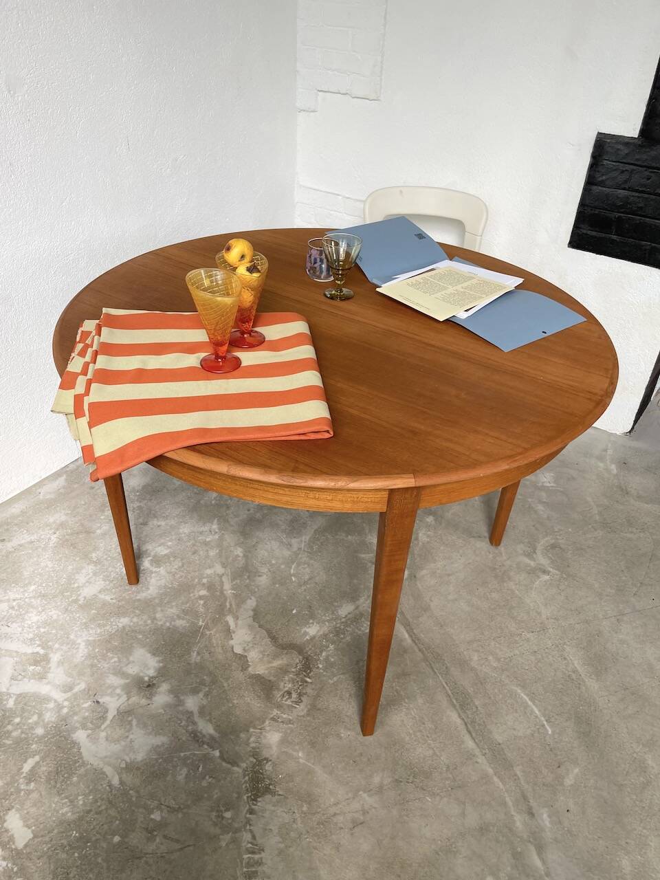Scandinavian round teak table with extension