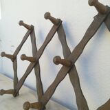 Wooden patères with braces