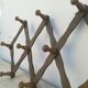 Wooden patères with braces