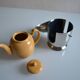Insulated ceramic teapot with metal and felt 0.5 liters