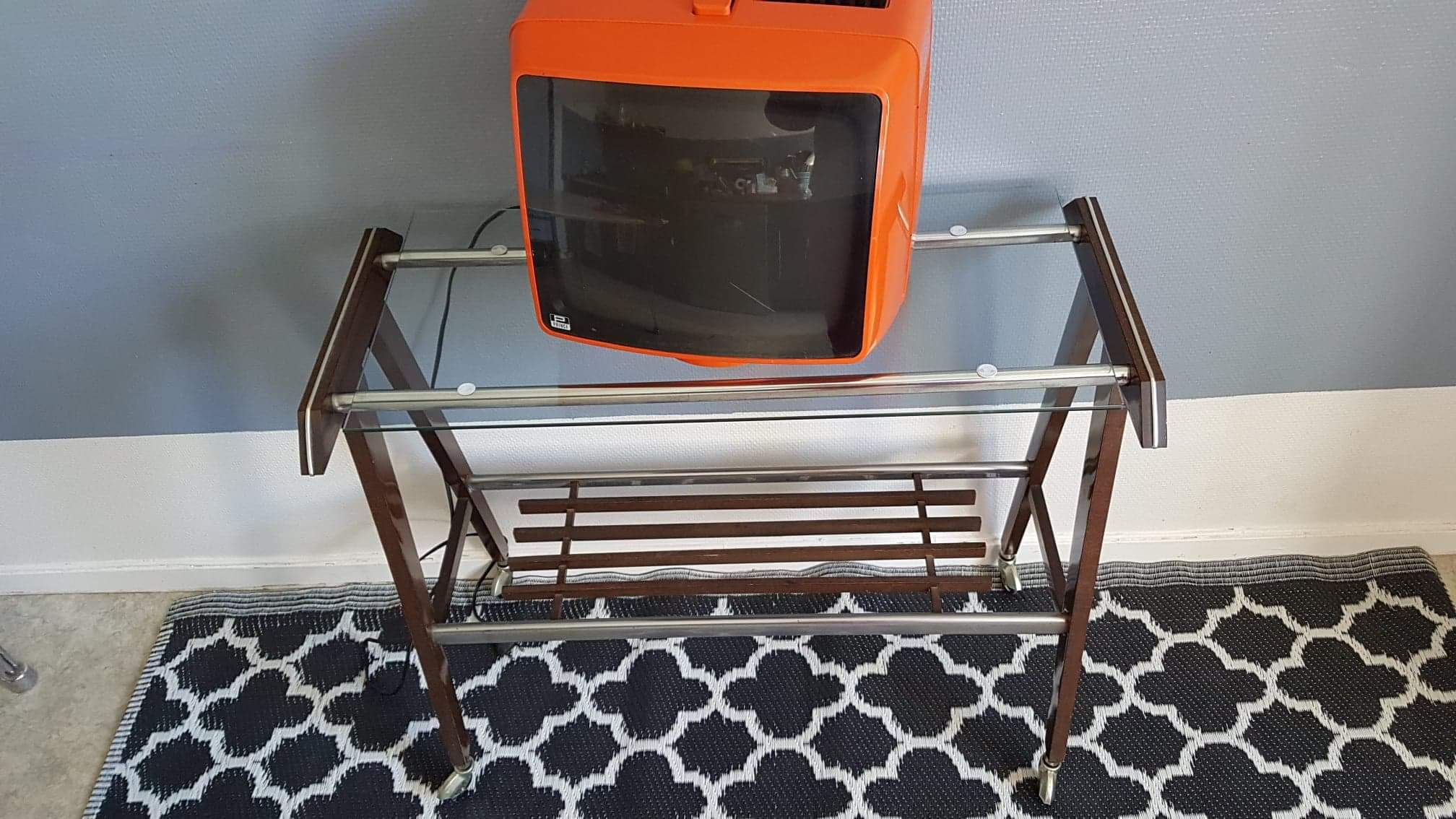 Vintage orange Prince portable TV
