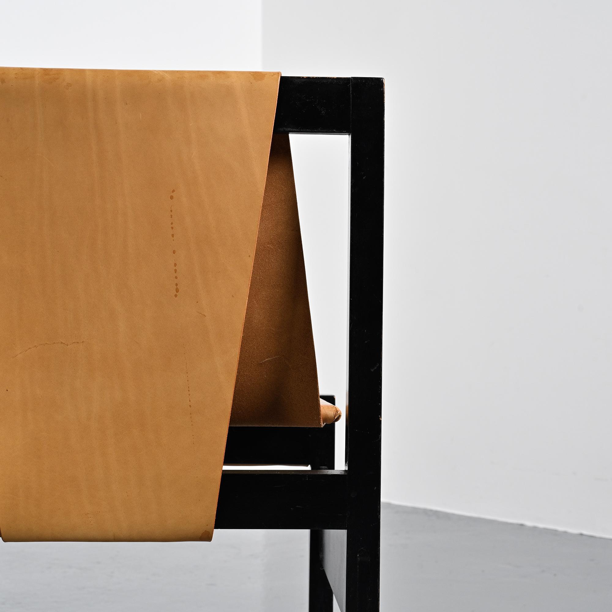 Set of black lacquered wooden chairs with leather, Swiss architect's work, 1980s.