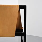 Set of black lacquered wooden chairs with leather, Swiss architect's work, 1980s.