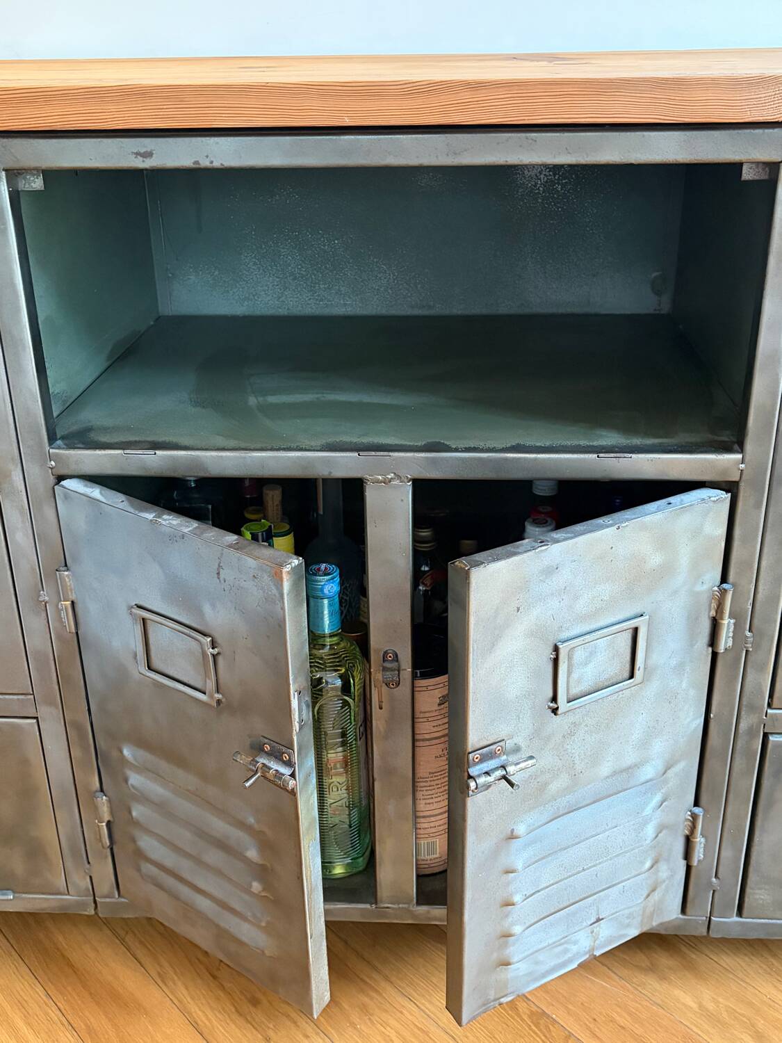 Storage furniture in steel and wood