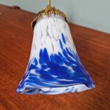 Wall light in gilded bronze and blue and white speckled glass