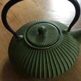 Green cast iron teapot