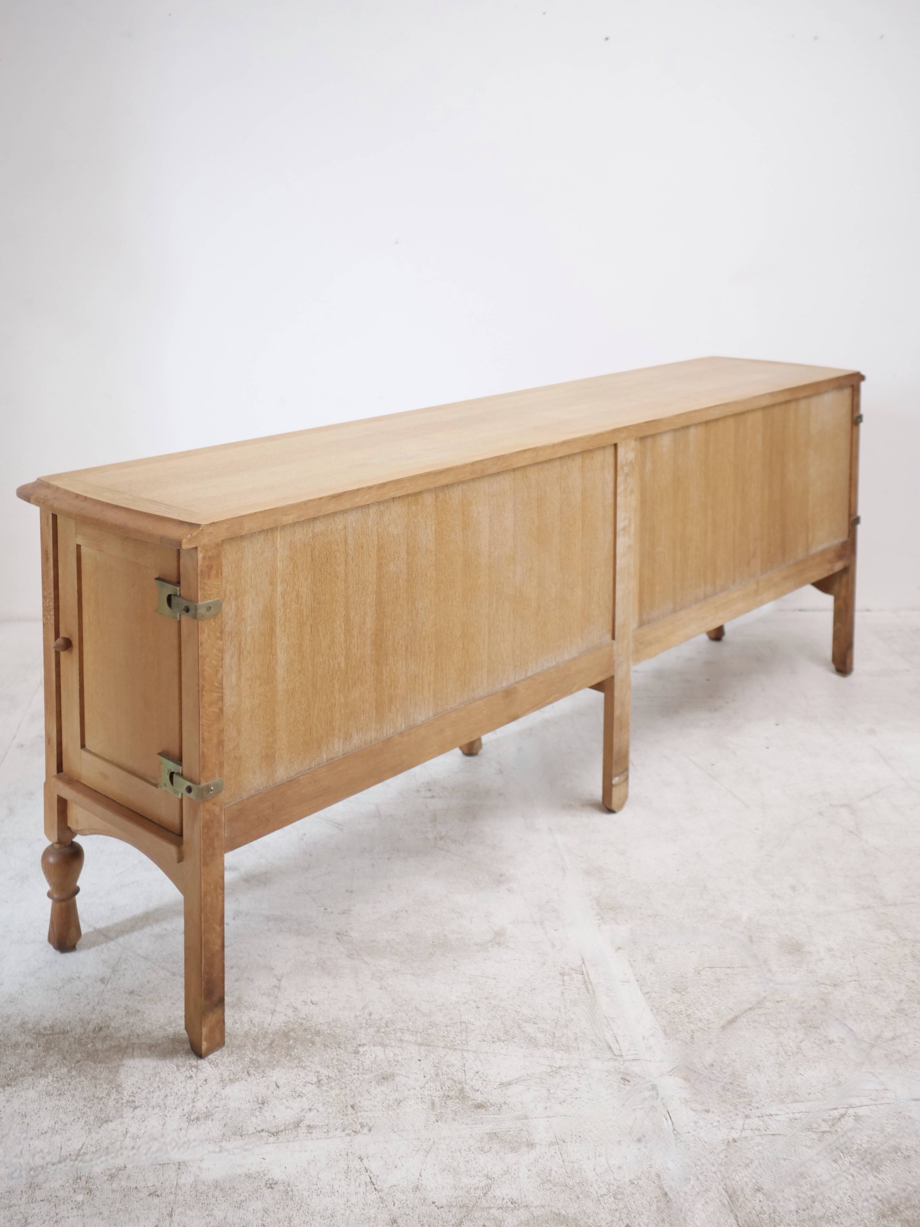 Guillerme and Chambron oak sideboard in light wood in a brutalist style.