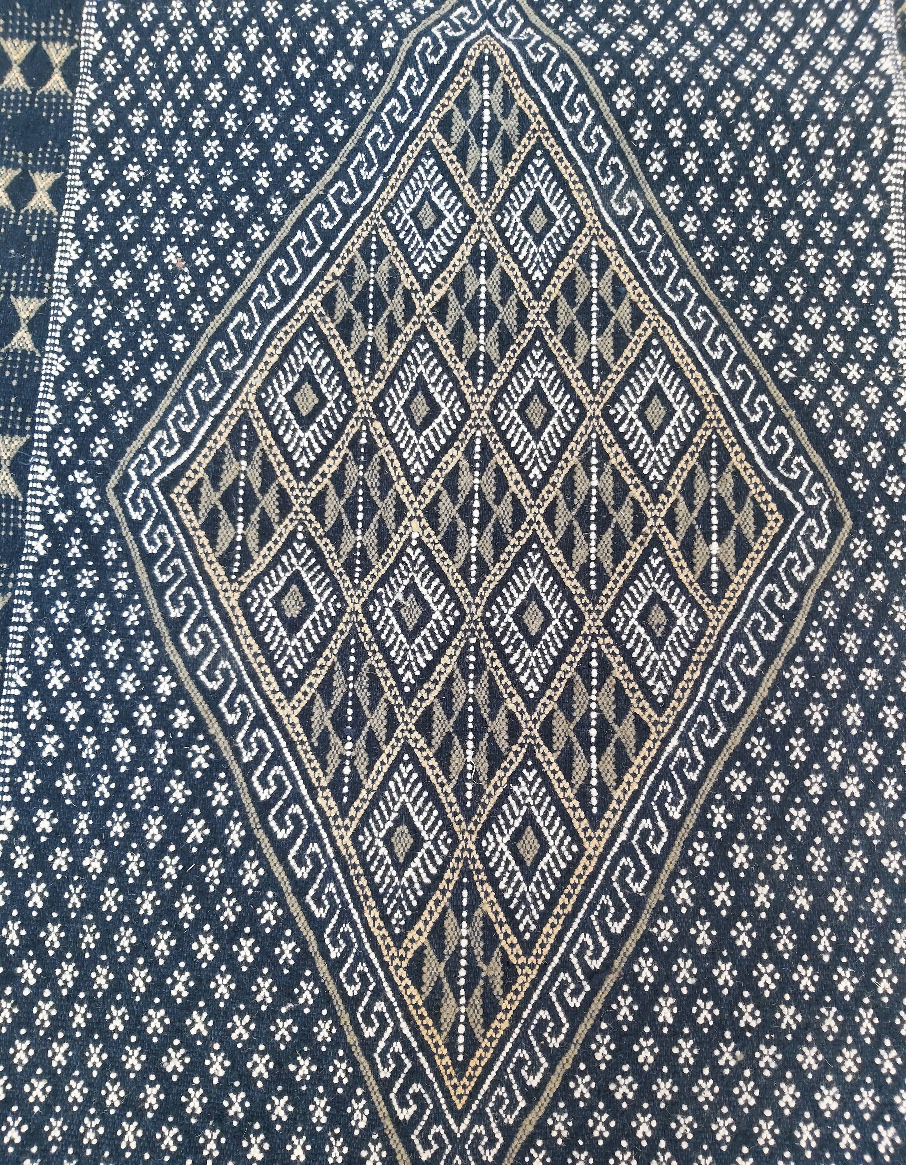 Hand-woven blue carpet in pure wool