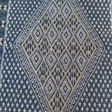Hand-woven blue carpet in pure wool