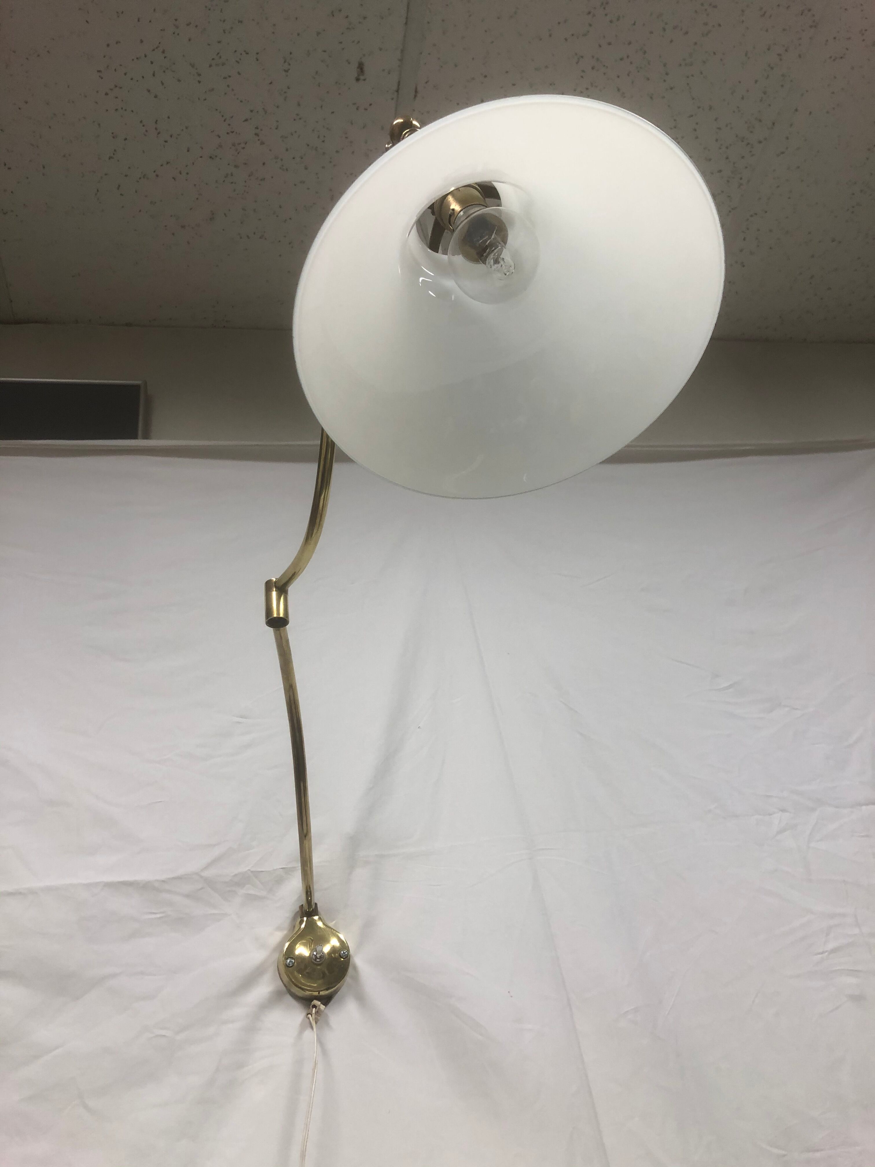 Articulated brass sconce 1950