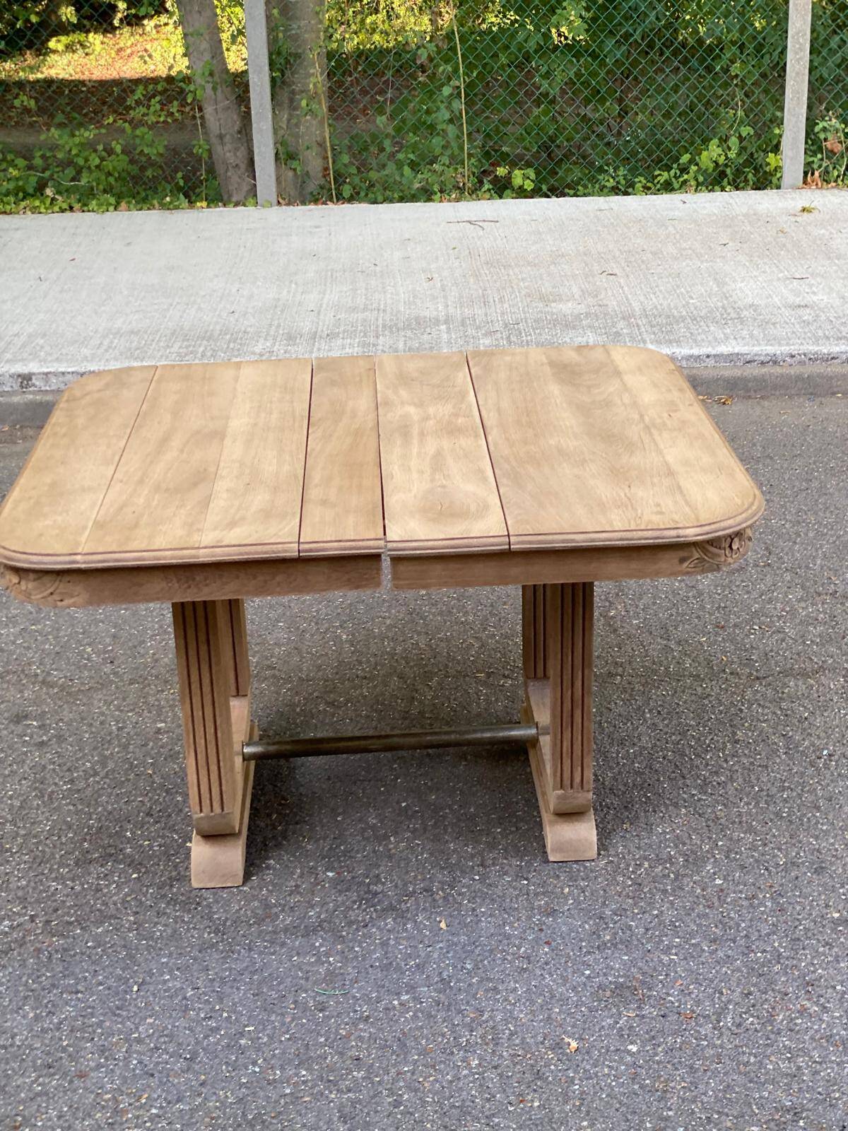 Rectangular Art Deco dining table with a central pedestal, stripped in solid oak.